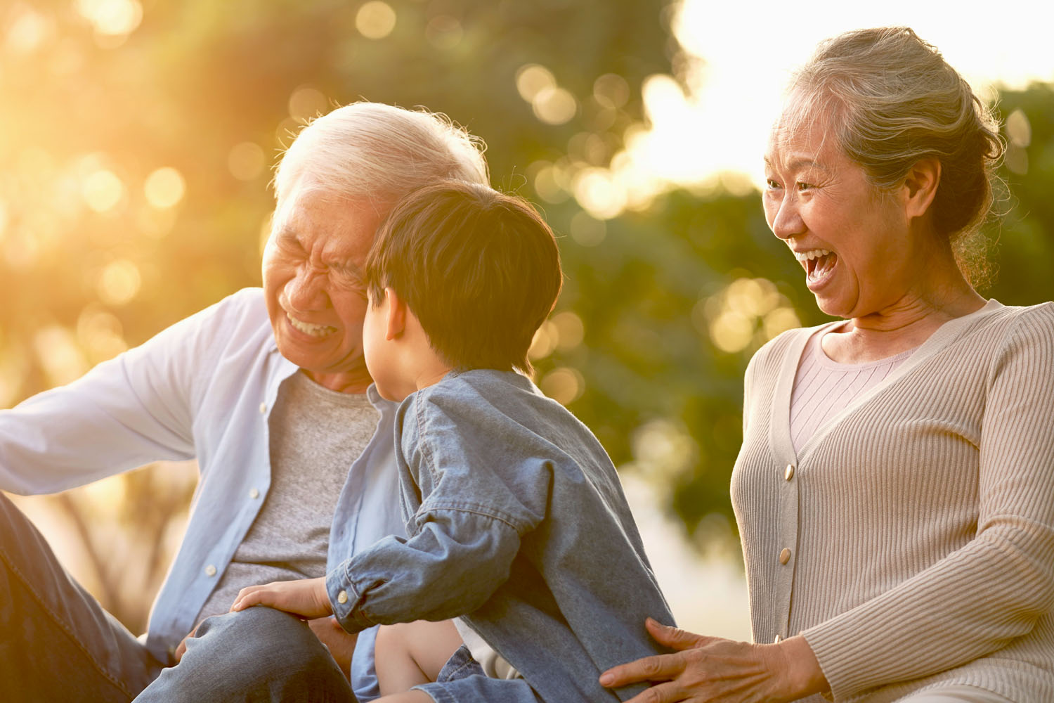 Radiology services photo with grandparents and grandchild playing